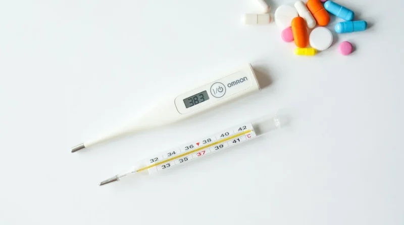Pillen und Thermometer