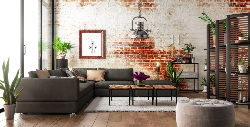 Ecksofa mit Ziegelwand im Hintergrund