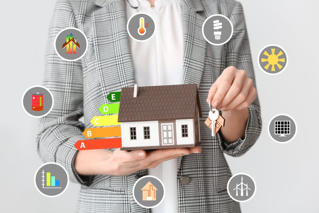 Haus mit Energielabel und Effizienzsymbolen | Dachbegrünung